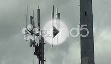 Technician Working On Top Of Cellular Antenna Tower 1